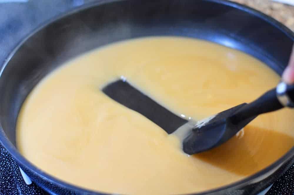 Showing the thickness of the sauce in the skillet