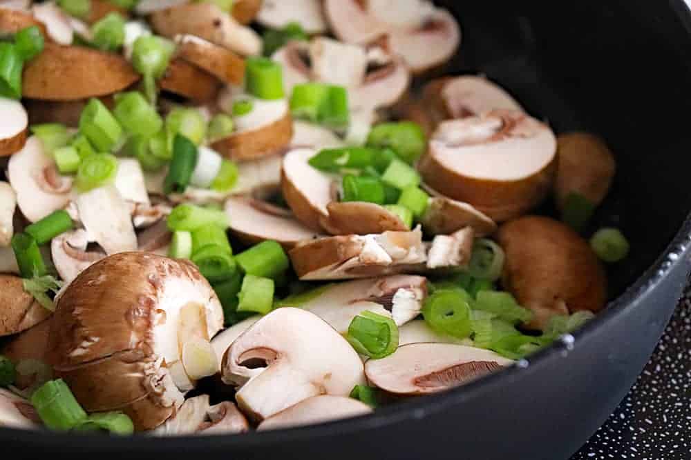 Mushrooms and green onions
