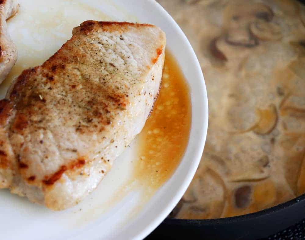 Add pork chops back to the sauce