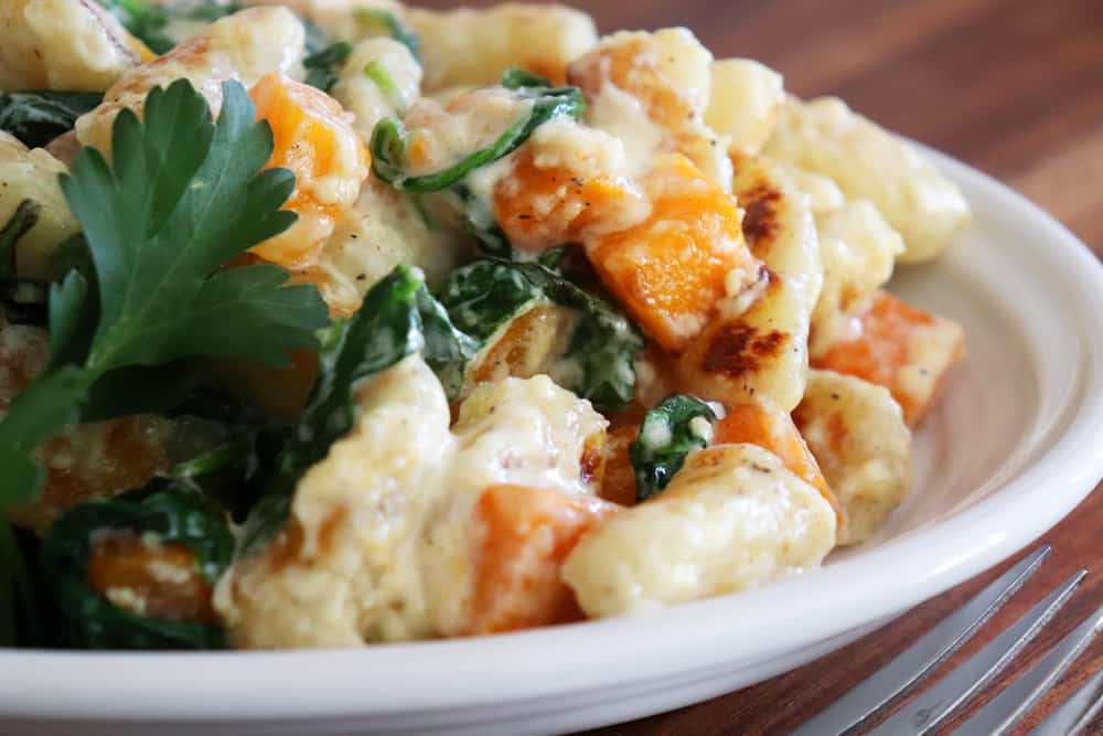 Plate of Creamy Gnocchi with Butternut Squash and Spinach