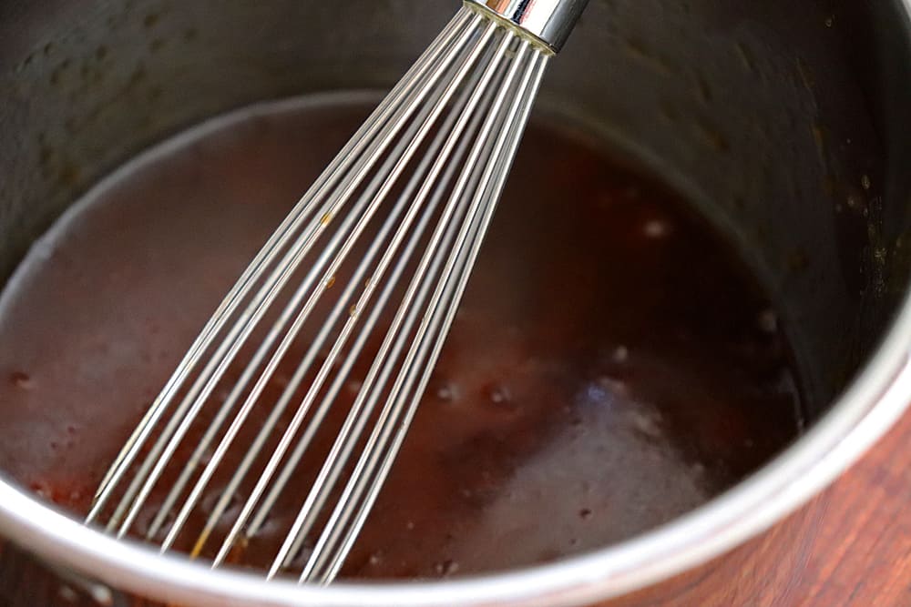 Whisking the sauce