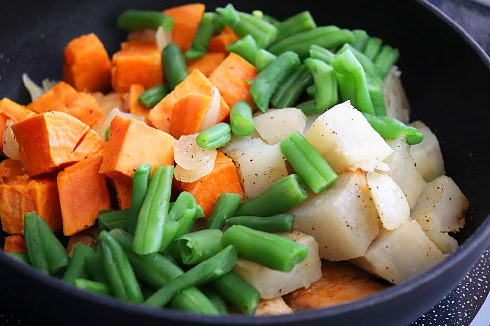 Add roasted vegetables and green beans