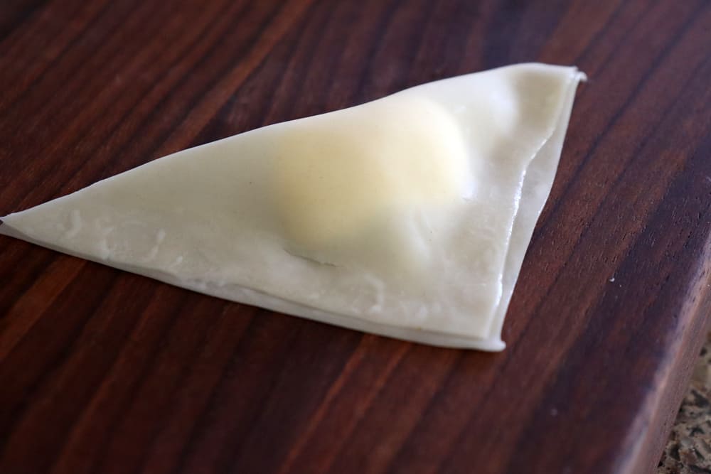 Seal the edges of the Sweet Cream Cheese Wontons