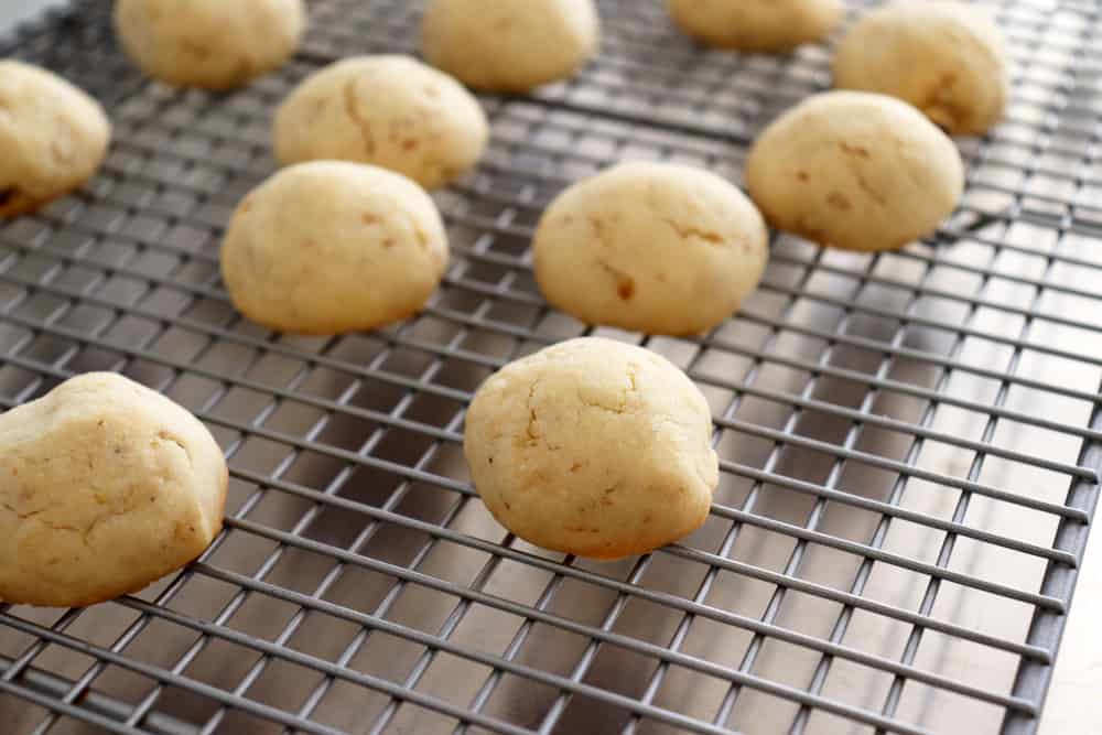 Baked and cooling Classic Snowball Cookies Recipe