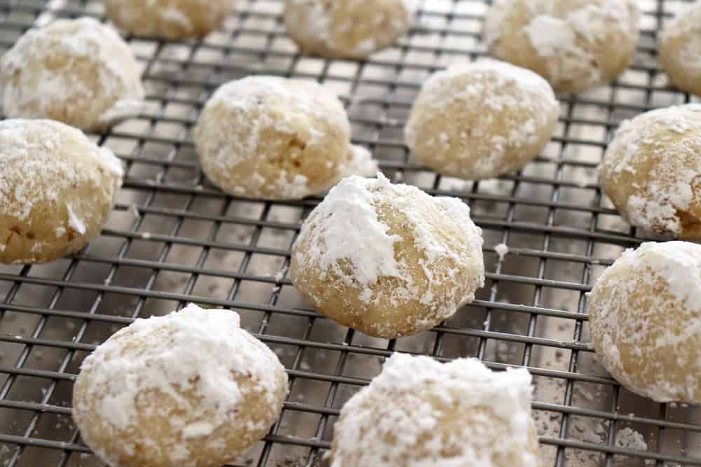 First roll in confectioners sugar Classic Snowball Cookies Recipe