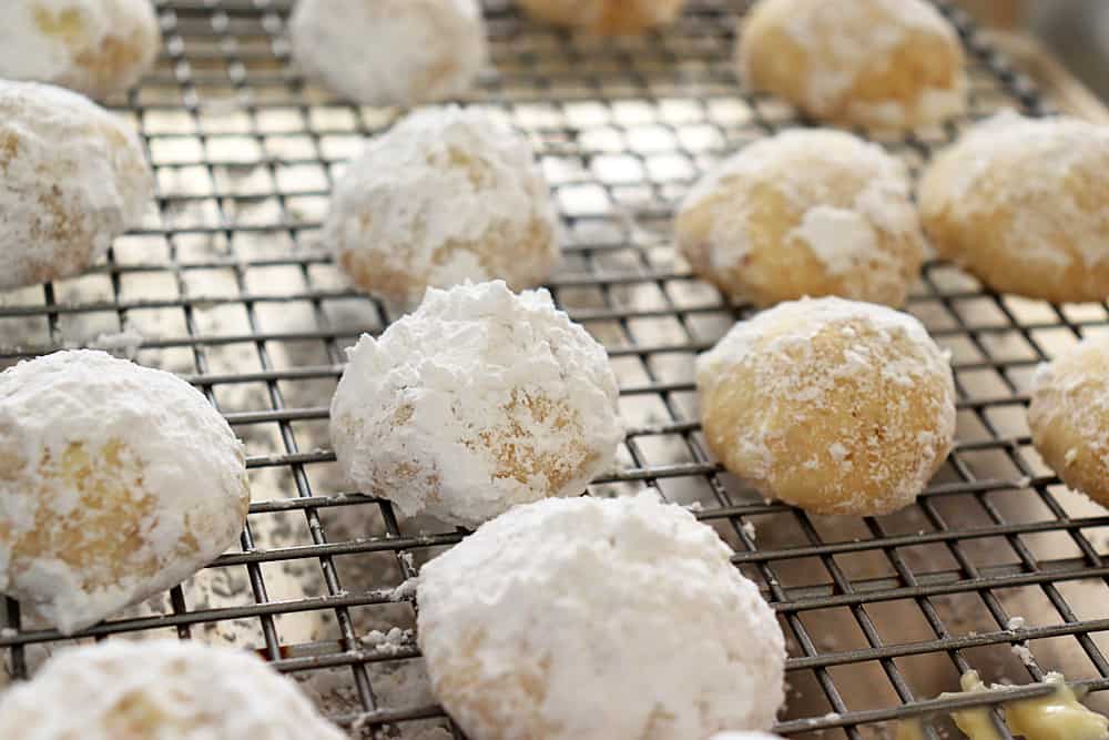 Second roll in the confectioners sugar Classic Snowball Cookies Recipe