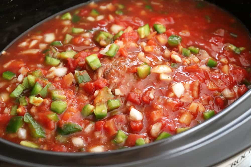 Stir and cook Slow Cooker Swiss Steak for 7 to 8 hours