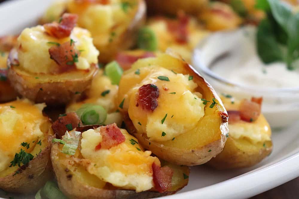 Plated Mini Loaded Cheddar and Bacon Potato Skins