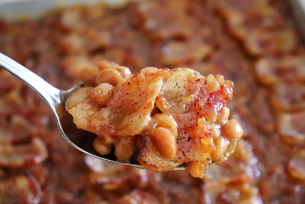 Bite shot of The Best Baked Beans with Bacon