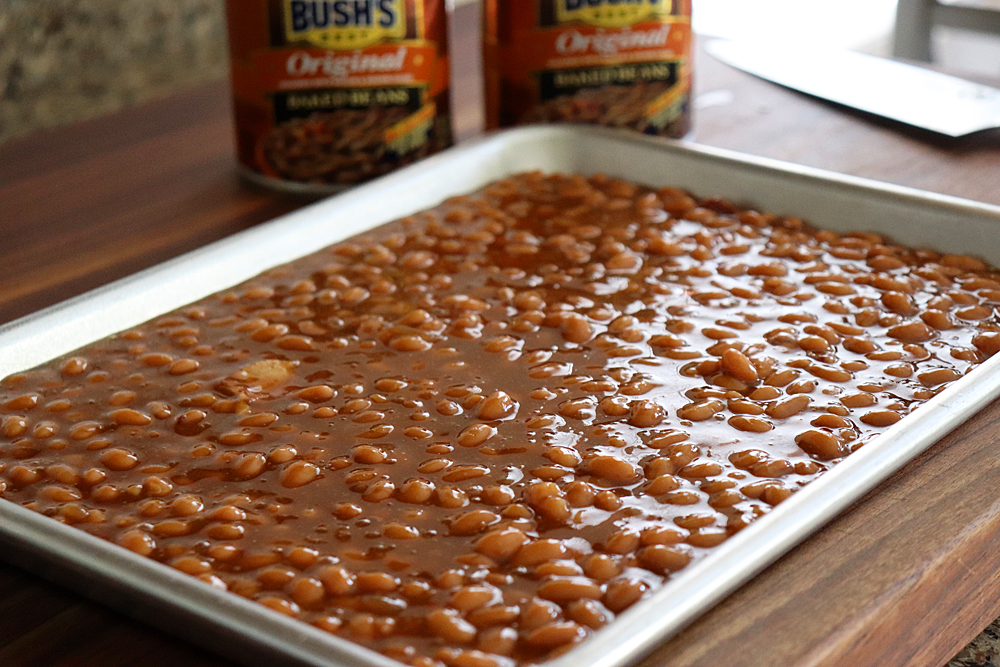 Add beans to a sheet pan