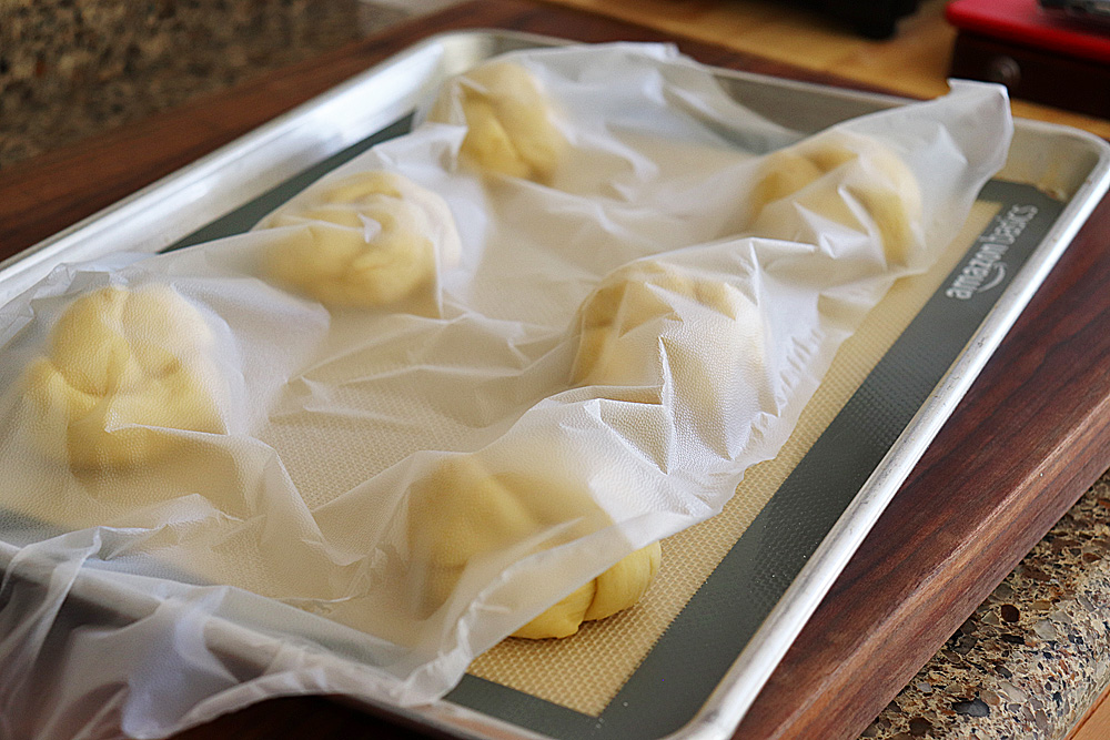 Loosely cover the Homemade Challah Rolls and allow to rise