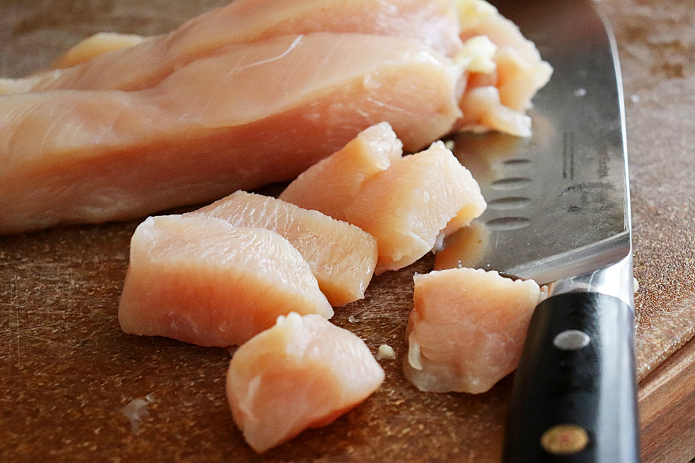 All white meat chicken breast cut into 1/2" pieces with a sharp chef's knife